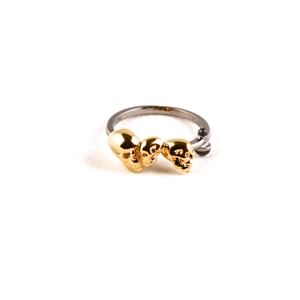 Gold chattering skull ring